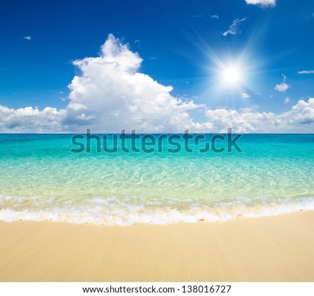 beautiful beach and tropical sea Royalty-Free Stock Photo #138016727
