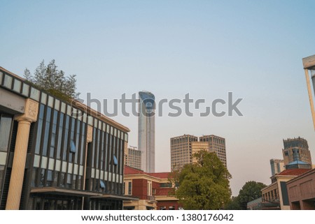 Low-angle photography of skyline of urban buildings in Suzhou, China