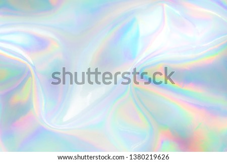 Abstract trendy holographic background. Real texture in pale violet, pink and mint colors with scratches and irregularities Royalty-Free Stock Photo #1380219626