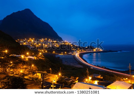 In the Jinguashi area of New Taipei City, Asia, there is a C-shaped coast that turns into a beautiful light when the vehicle passes by at night.
