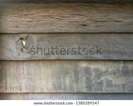 Old wood wall with hole