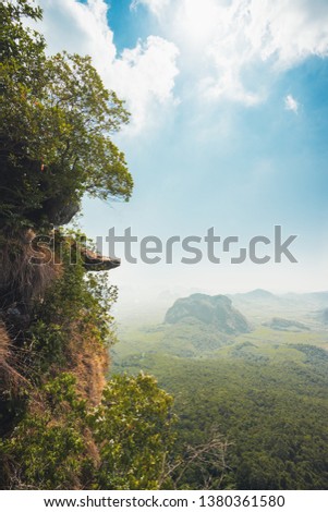 Edge of the cliff at Dragon Crest or Tab Kak Hang Nak Hill Nature Trail. View point Royalty-Free Stock Photo #1380361580