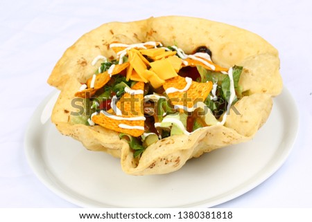 Healthy fresh salad with in taco 