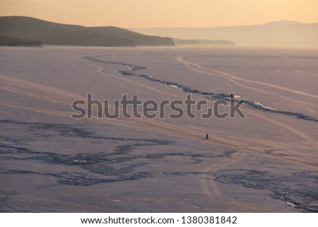 sunset view of frozen Baikal lake in winter from Olkhon island view point, Russia
