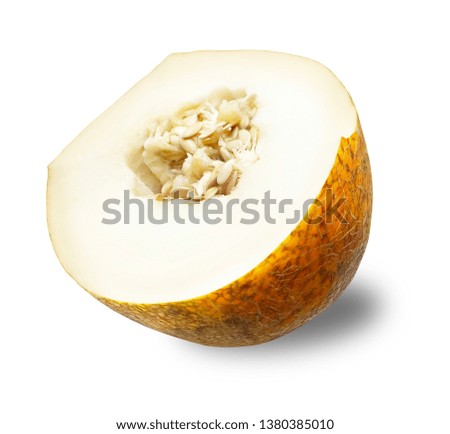 Half of a yellow melon isolated on white background. Spanish dessert