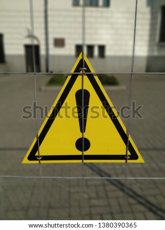 The attention sign on the iron grid