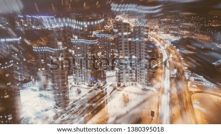picture with double exposure. abstract toned industrial background. skyline by night. aerial view. drone shot