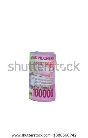 rolls of Indonesian money rupiah. Isolated on white background This photo was taken on April 25, 2019
