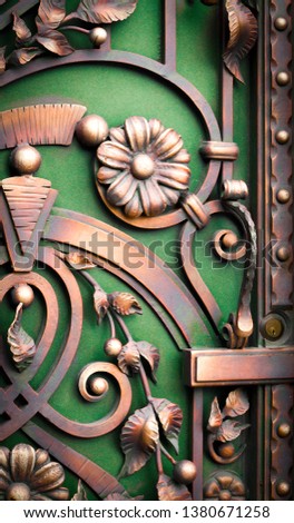 brass antique door with ornaments close