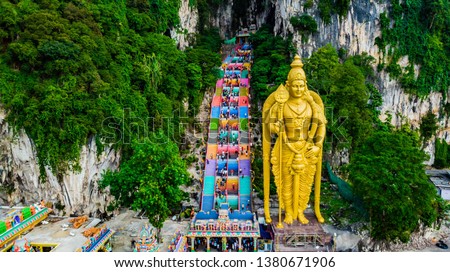 Drone shot of the awesome and colorful stairs of the Batu Caves next to Kuala Lumpur, Malaysia.