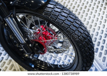 Front wheel of modern motorcycle with disc brakes.
