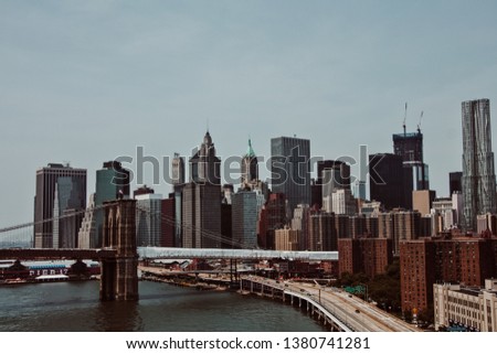 New York skyline taking while crossing a bridge in the morning. Travel photography