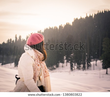 Girl over looking Snow Forest 