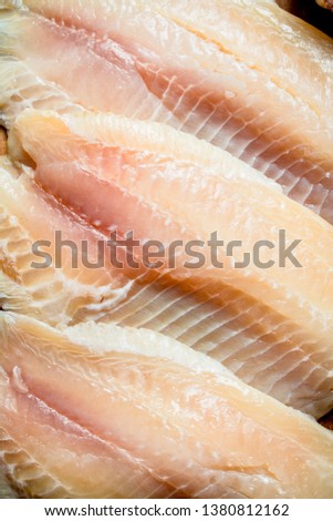 Tilapia fish fillet. Top view