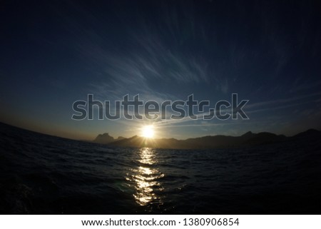 sunset while sailing along the coast