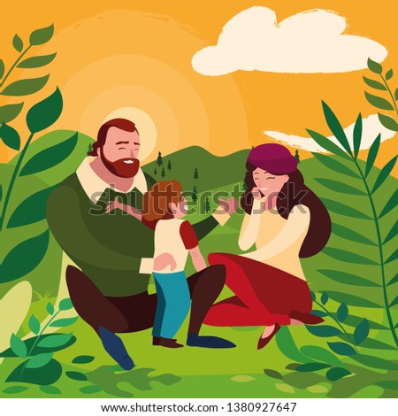 parents couple with son in the field