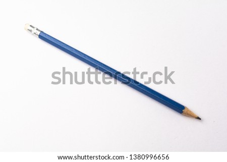 blue pencil in a white background
