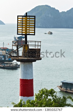 Lighthouse sea view Cat Ba Archipelago natural ecosystems Ha Long Bay Cruises. Trip To Vietnam Harbour of Cat Ba town Lighthouse Sea mountain view.