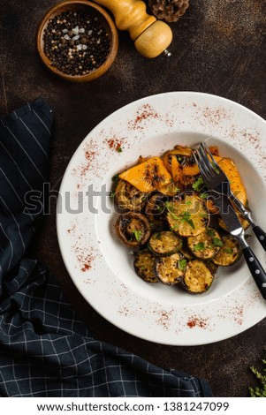 Grilled mushrooms, peppers and zucchini served on plate with lemon– stock image