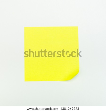 Yellow paper stick note on a white background - Image