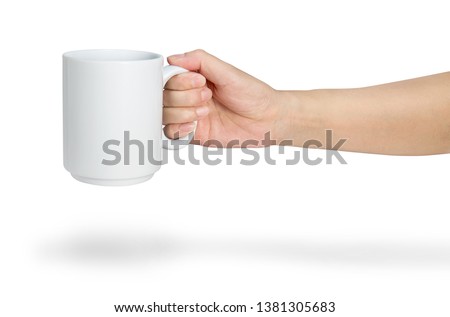Hand holding a ceramic mug isolated on white with clipping path Royalty-Free Stock Photo #1381305683
