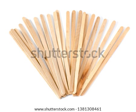wooden coffee stick on white background Royalty-Free Stock Photo #1381308461