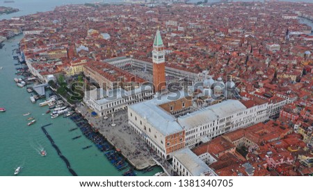 Aerial drone photo of iconic and unique Saint Mark's  square or Piazza San Marco featuring Doge's Palace, Basilica and Campanile, Venice, Italy
