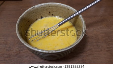 Mixing egg whites and yolks well