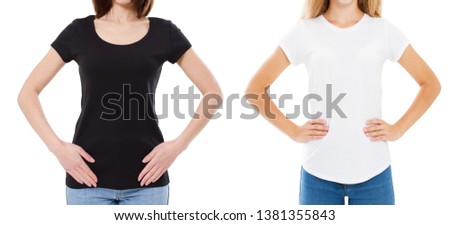 Close up of woman in blank black and white t-shirt. Mock up of tshirt isolated on white. Girl in stylish t shirt.