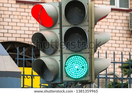 Electric traffic light.Green,red and yellow security signals.Pedestrian crossing