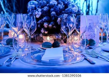 winter table settings for christmas event, dinner gala and charity dinner Royalty-Free Stock Photo #1381390106