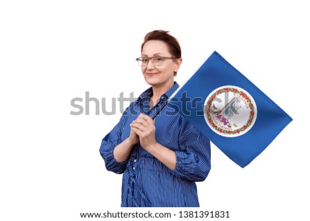 Virginia flag. Woman holding Virginia state flag. Nice portrait of middle aged lady 40 50 years old holding a large state flag isolated on white background.