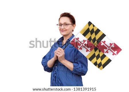 Maryland flag. Woman holding Maryland state flag. Nice portrait of middle aged lady 40 50 years old holding a large state flag isolated on white background.