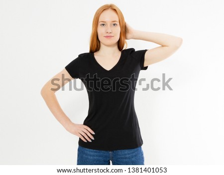 Beautiful red hair girl in a black t-shirt isolated on white. Pretty smile red head woman in tshirt mock up blank.