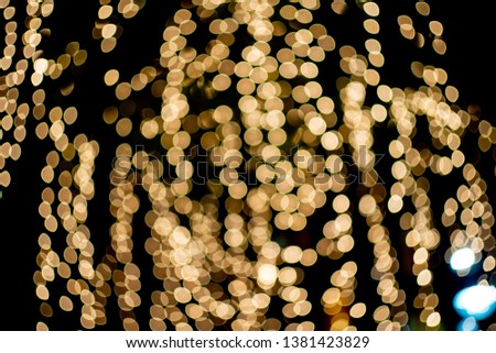 light night city bokeh abstract background glittering stars on bokeh. Orange bokeh in the bottom of the picture. Has a black background Blur - Image