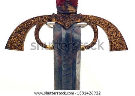 A beautiful old Spanish's military sword on white background from  Colonialism era