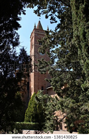 Italy, Tuscany: Bell tower of Monte Oliveto Abbey, founded in 1313.