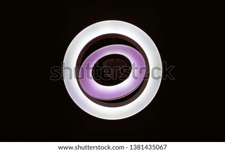 circular lights perfectly centered on a black background