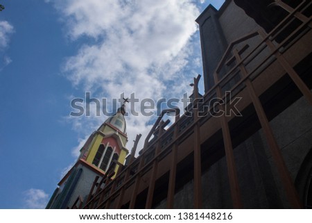 Beautiful colors in a church and the sky that surrounds it through the streets of the west of Caracas in Venezuela