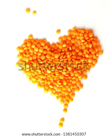 Red lentils on white background. legumes.