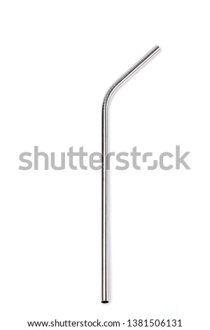Curved Ecological stainless steel straw on a white background. Royalty-Free Stock Photo #1381506131