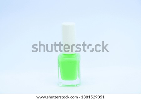 Gel polish modern technology. Pick color. Nail polish bottle bright color. Manicure salon. Beauty and care concept. Nail polish white background. Durability and quality of nail polish coating.