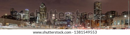 Panoramic view of Montreal downtown at night in winter