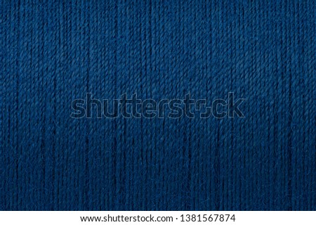 Macro picture of dark blue thread rough texture surface background Royalty-Free Stock Photo #1381567874