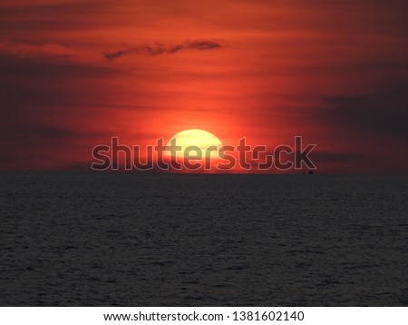 Sunset horizon sea water landscape. Sunset in Phuket Royalty-Free Stock Photo #1381602140