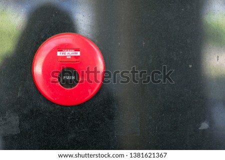 Fire alarm box on cement wall for warning and security system in the condominium place. standard safety in the resident, shopping mall and public place concept. image for copy space, background.