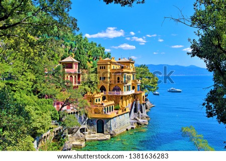 Taken on a beautiful blue sky day, in Italy, in Easter, 2019, capturing the complementary hues of the sky and the Ligurian sea. Royalty-Free Stock Photo #1381636283