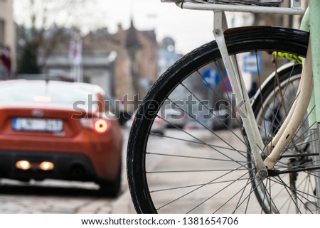 
parked bike in the background of the city