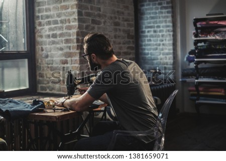Fashion designer working in his studio