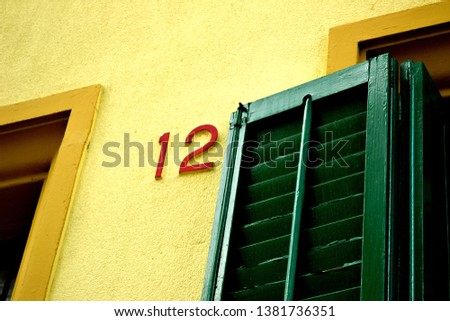 
Green shutters on an old window in Barcelona, Spain